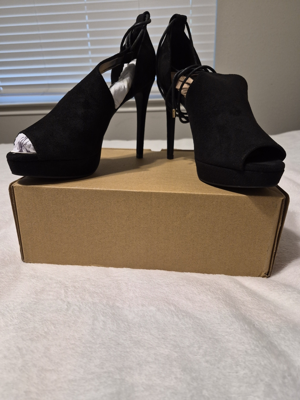 Sleek Black Peep-Toe Stiletto Heels with Ankle Wrap
